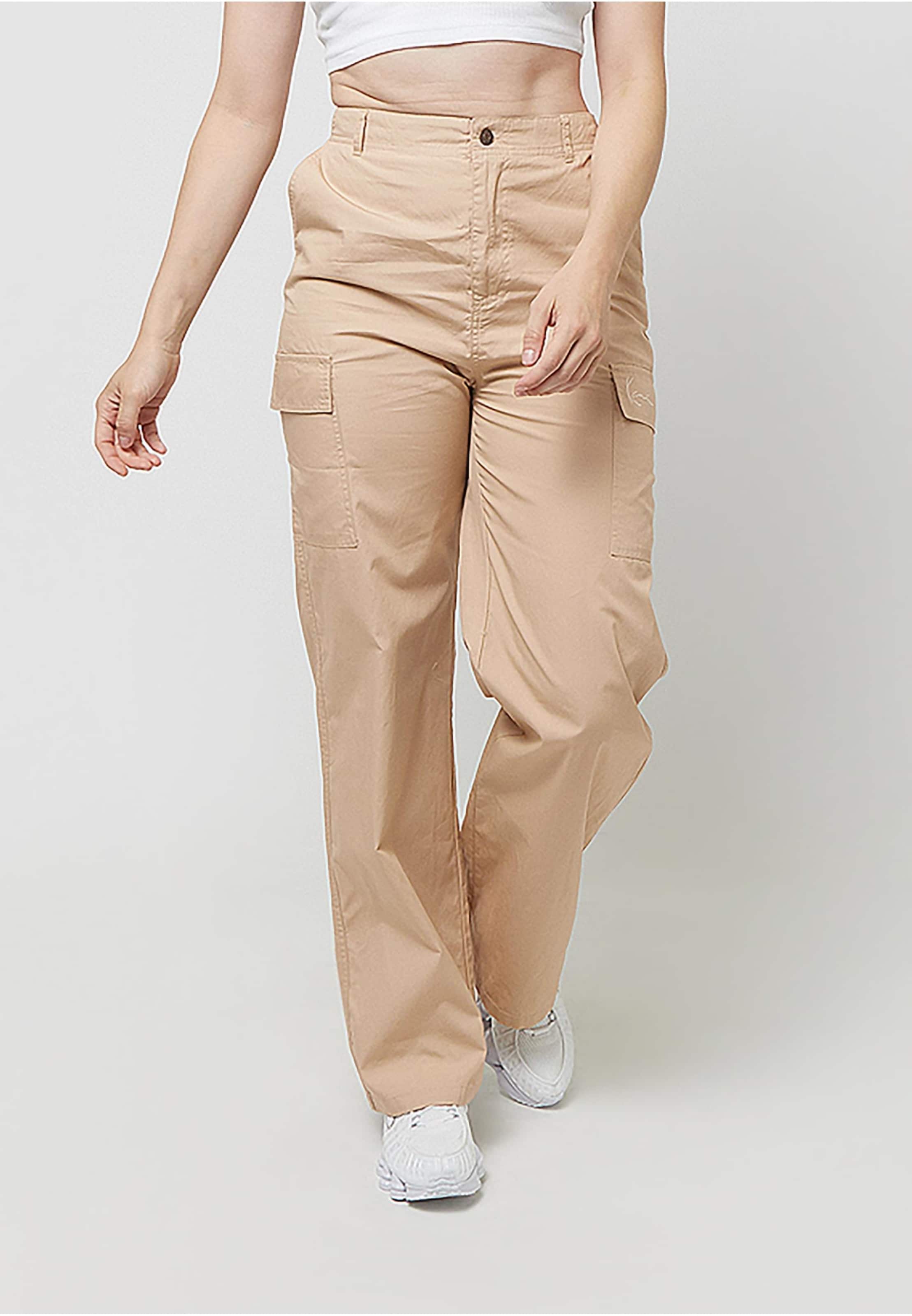 

Karl Kani Широкие карго-штаны бежевого цвета