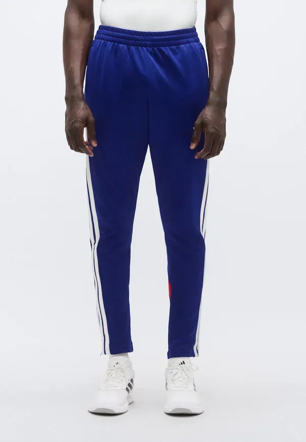 Спортивные штаны Adidas Sportswear House of tiro nations pack, цвет мистические чернила/чистый рубин/белый