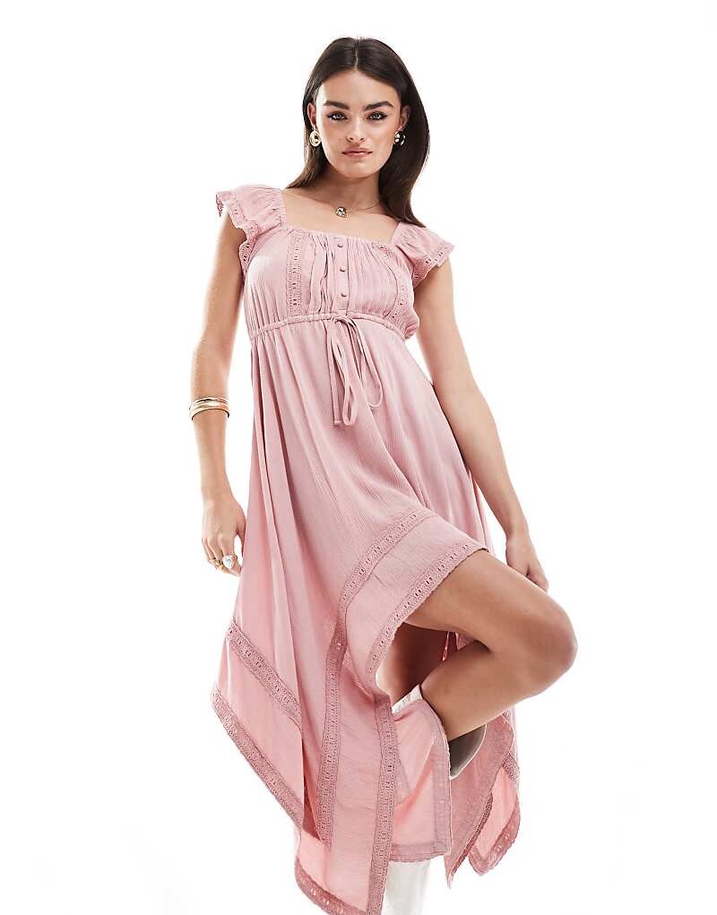 

Розовое мини-платье с асимметричным подолом и рюшами Miss Selfridge