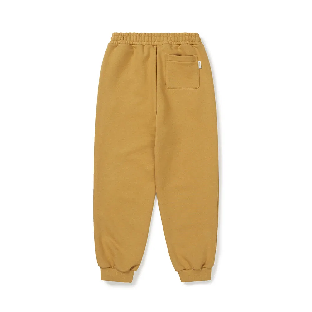 Детские графические джоггеры горчичного цвета от Snowpeak Apparel Kids — фото 3