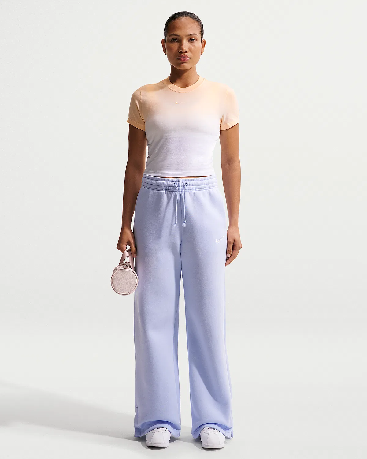Женская укороченная футболка Nike Sportswear Chill Knit Slim, Ice Peach/White — фото 4