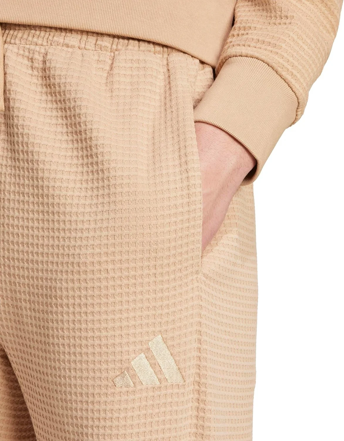 Мужские брюки Adidas All Season из вафельной вязки свободного кроя с открытым низом, Warm Sandstone — фото 3