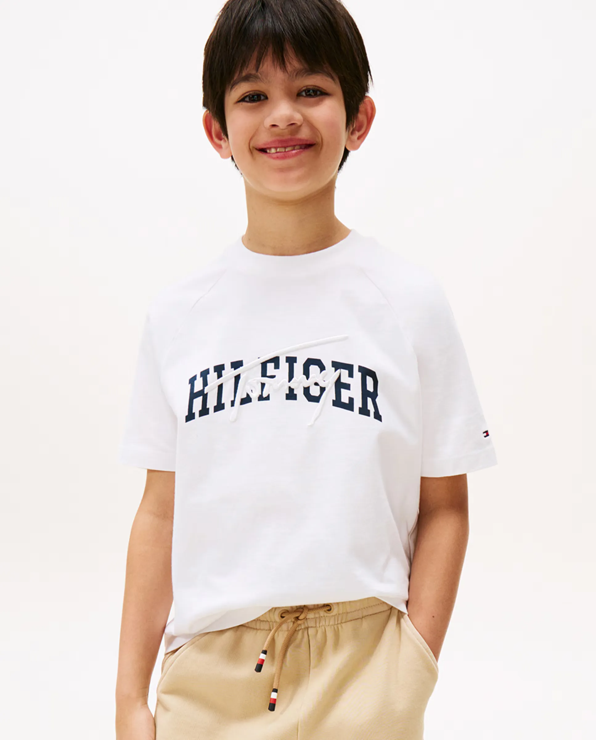 

Детская однотонная футболка с коротким рукавом и логотипом на груди Tommy Hilfiger, белый