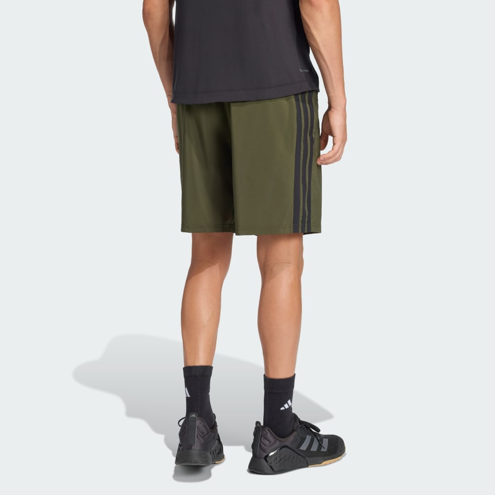 Спортивные шорты Adidas Essentials Training 3-Stripes Woven Shorts, цвет Night Cargo — фото 2