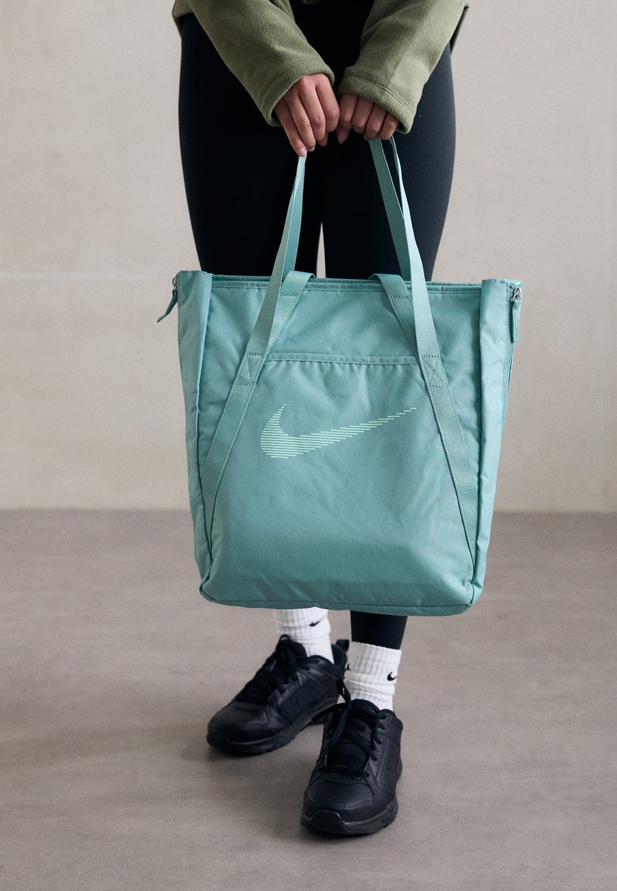 

Спортивная сумка Nike Performance GYM TOTE, Cannon/Mint Foam/Light Green