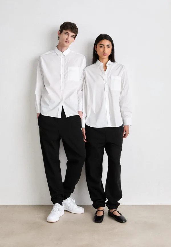 Спортивные штаны унисекс Lacoste, Black — фото 2