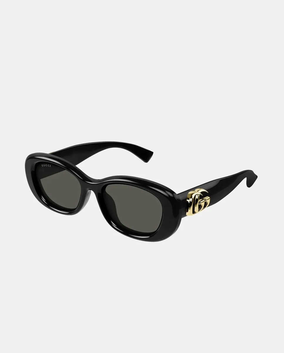 

Овальные литые женские солнцезащитные очки Gucci, черный