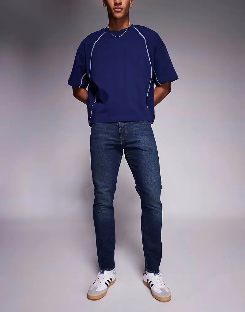 Джинсы Levi's 512 зауженного кроя, темного цвета