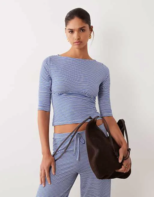 

Однотонный топ в полоску с длинными рукавами и завязками ASOS DESIGN