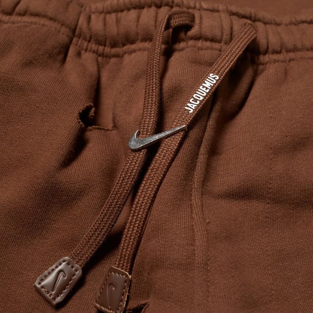 

Nike Брюки-галочки x Jacquemus, коричневый