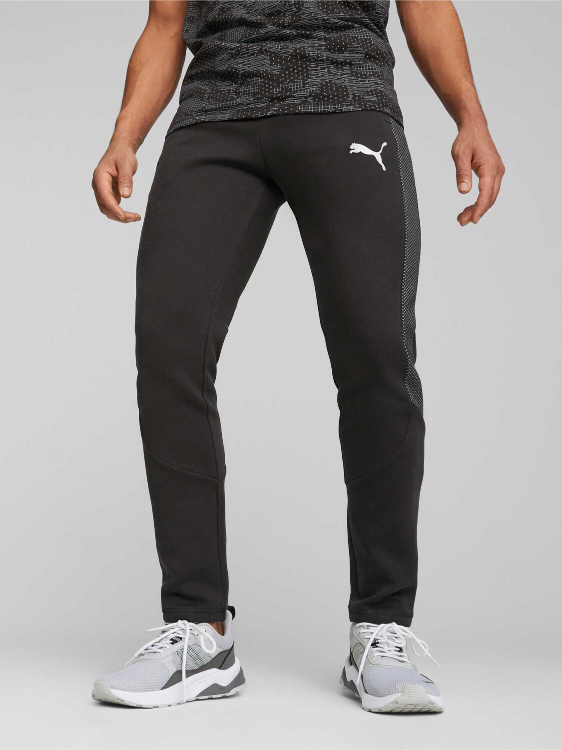 

Спортивные брюки Puma EVOSTRIPE Pants DK, черный