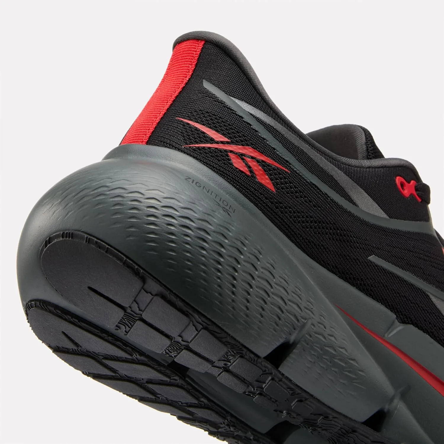 Кроссовки Reebok Herren Zignition, черный/красный — фото 2