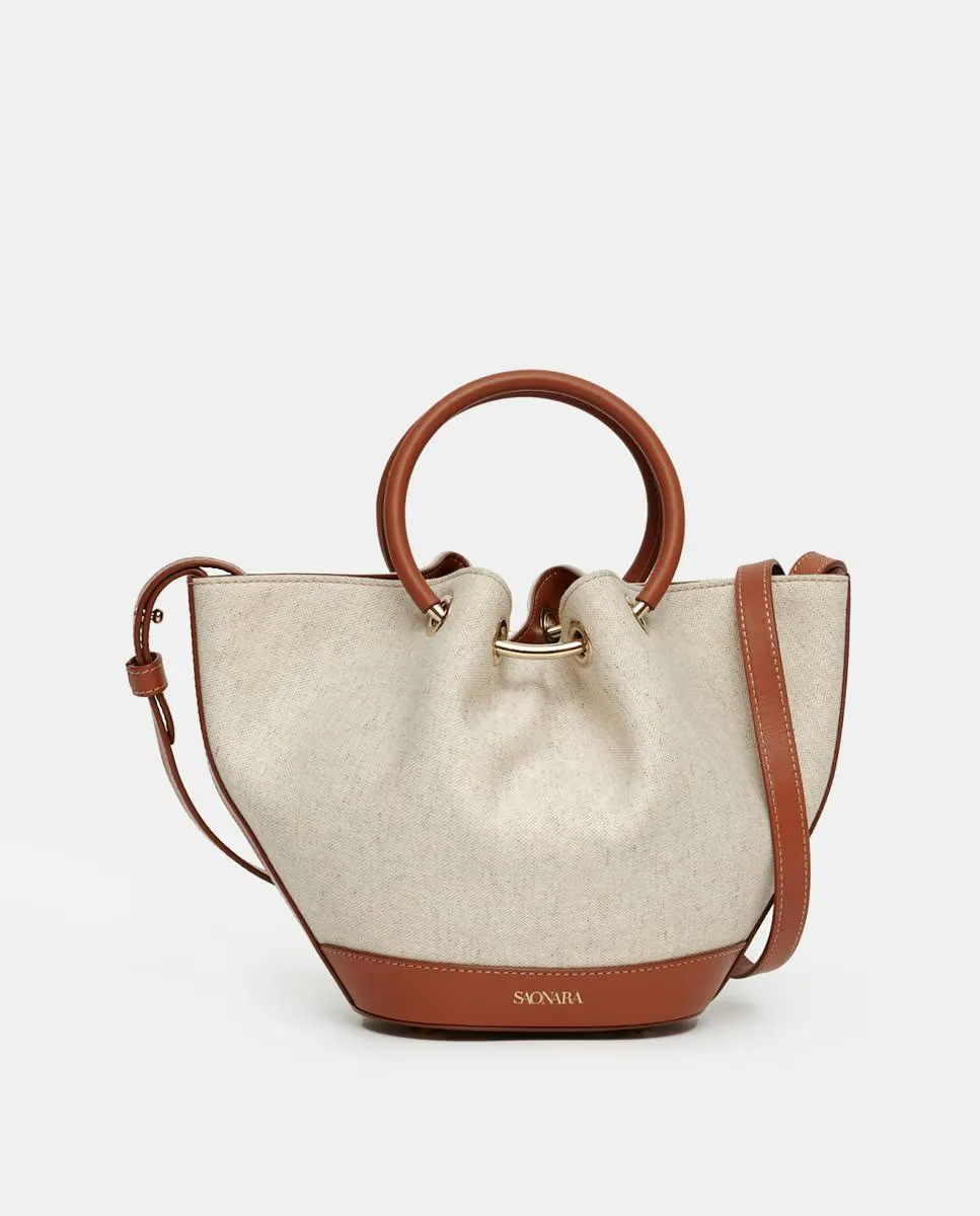 

Маленькая ручная сумка SAONARA из карамельной кожи в сочетании со льном с регулируемым ремнем, естественный