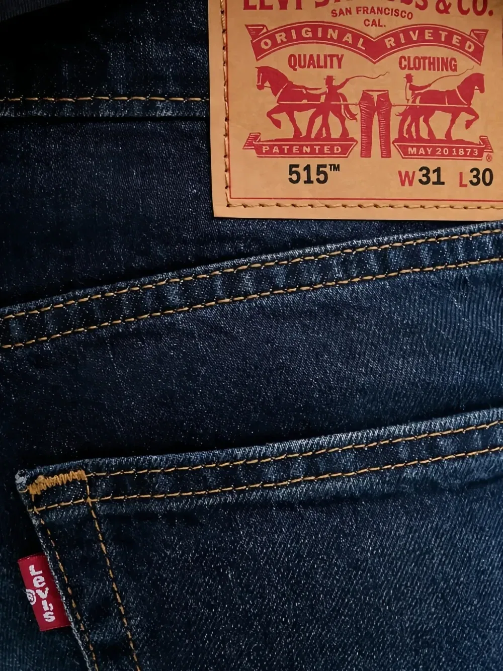 Джинсы 515 Slim Taper Levi's, синий — фото 4