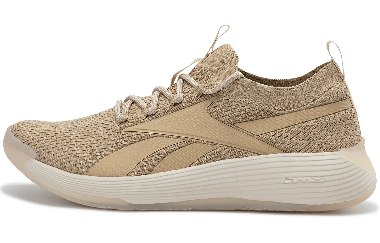 

Кроссовки Dmx Comfort унисекс с низким верхом бежевого цвета Reebok