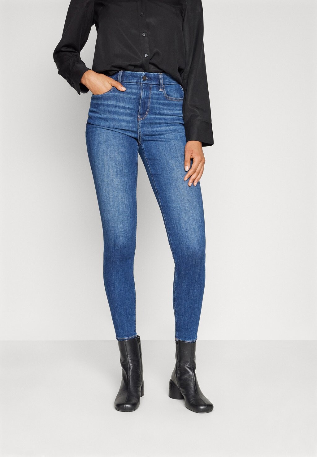 

Джеггинсы CURVY HIGH RISE American Eagle, темный цвет