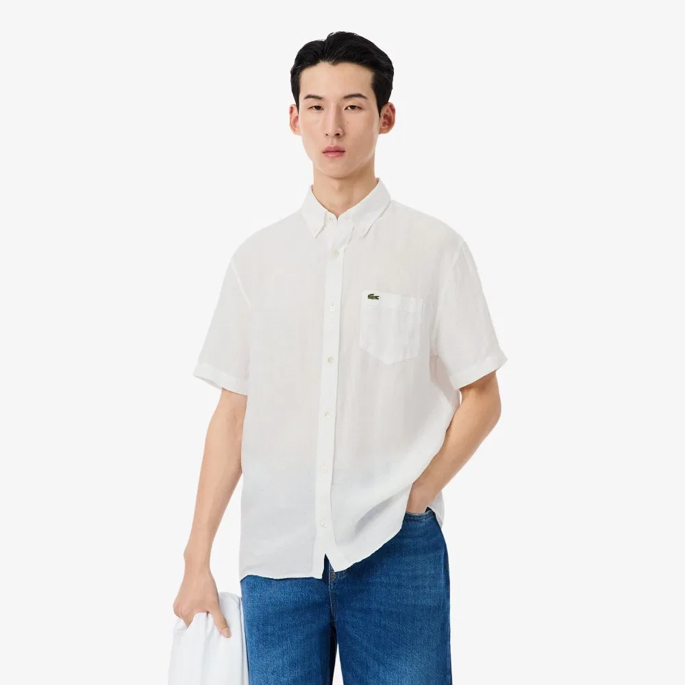 Мужская однотонная льняная рубашка с коротким рукавом белого цвета от Lacoste