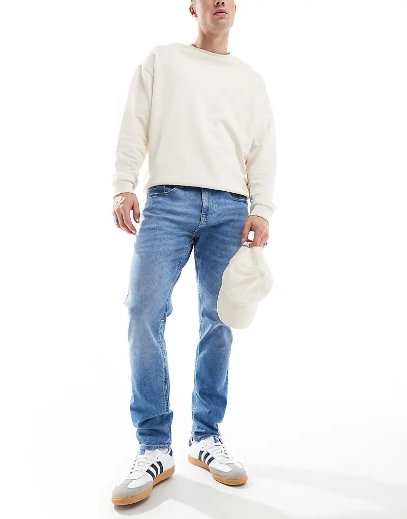 

Узкие зауженные джинсы синего цвета Tommy Jeans