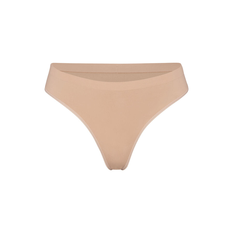 

Стринги SKIMS Soft Smoothing Seamless, цвет Clay