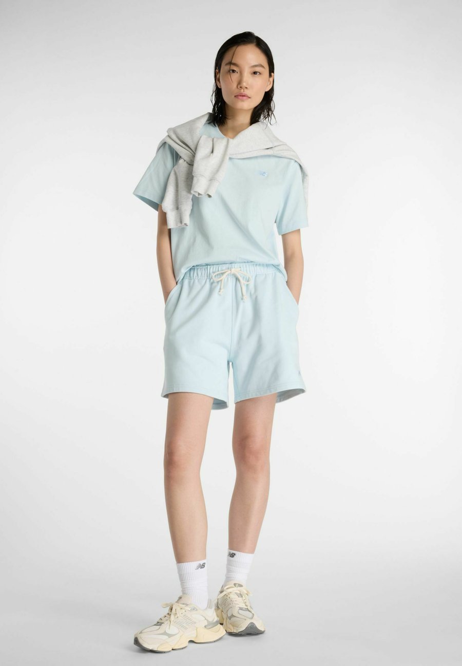 

Шорты New Balance ATHLETICS FRENCH TERRY SHORT., Frosted Glass/Blue