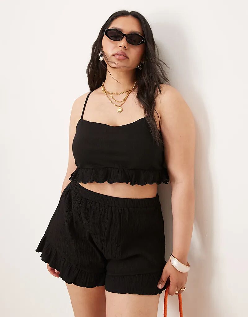 

Укороченный топ ASOS DESIGN Curve Co-ord с оборкой и жатым подолом черного цвета Asos Curve