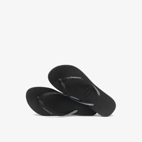 Тонкие резиновые шлепанцы на плоской подошве с блестящими ремешками Havaianas, черный — фото 4