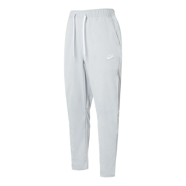 

Брюки клубные тканые зауженные брюки Nike, серый
