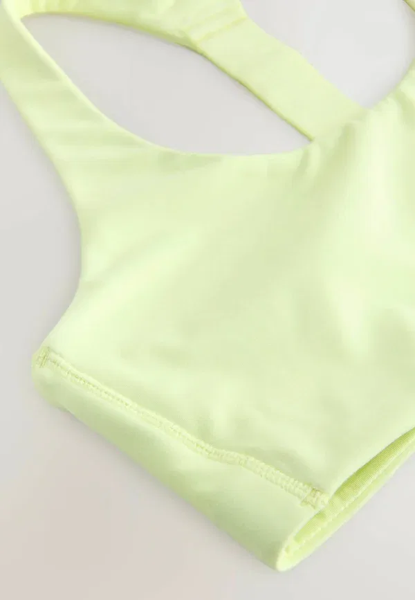 Топ спортивный Next, Regular fit t back medium impact sports bra, желтый — фото 4