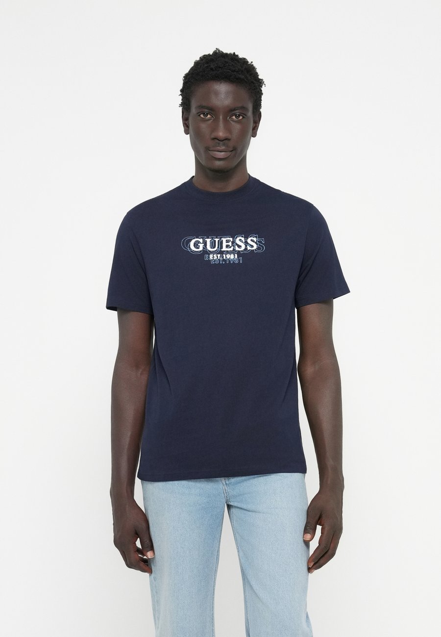

Футболка Guess SMALL LOGO TEE, Smart Blue/Dark Blue
