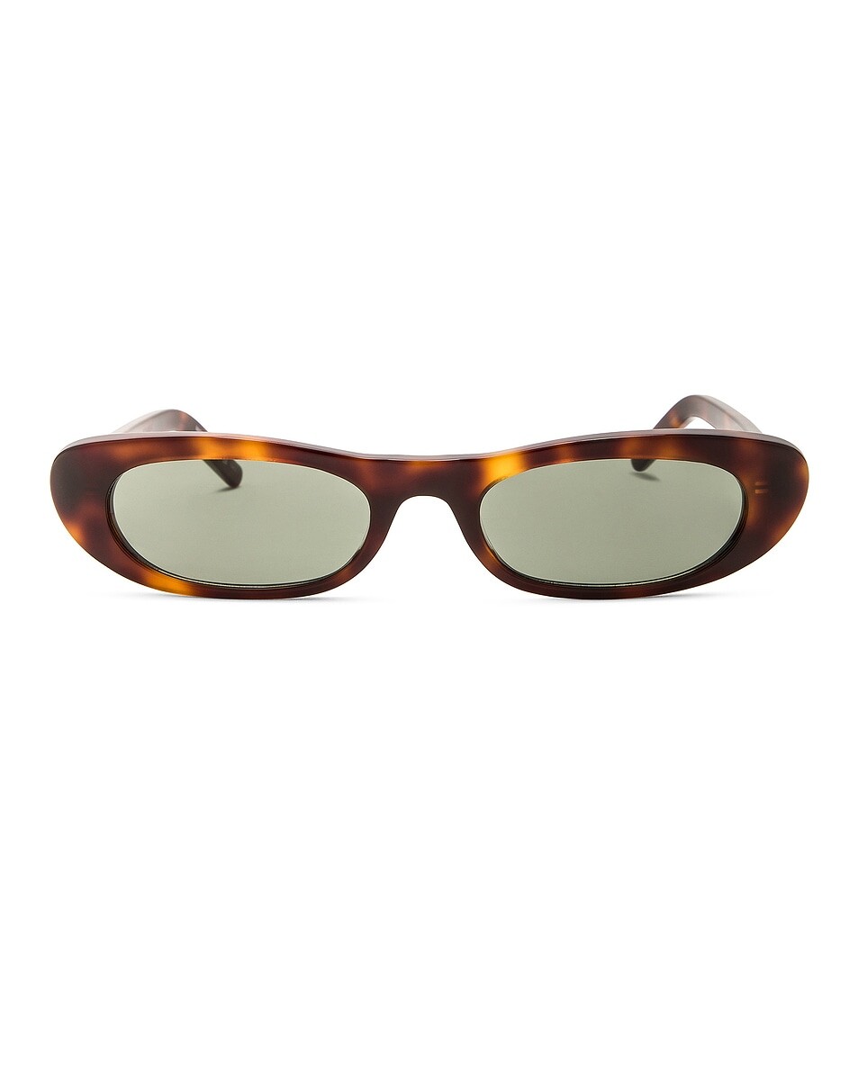 

Солнцезащитные очки SL 557 оттенка Saint Laurent, цвет Medium Havana