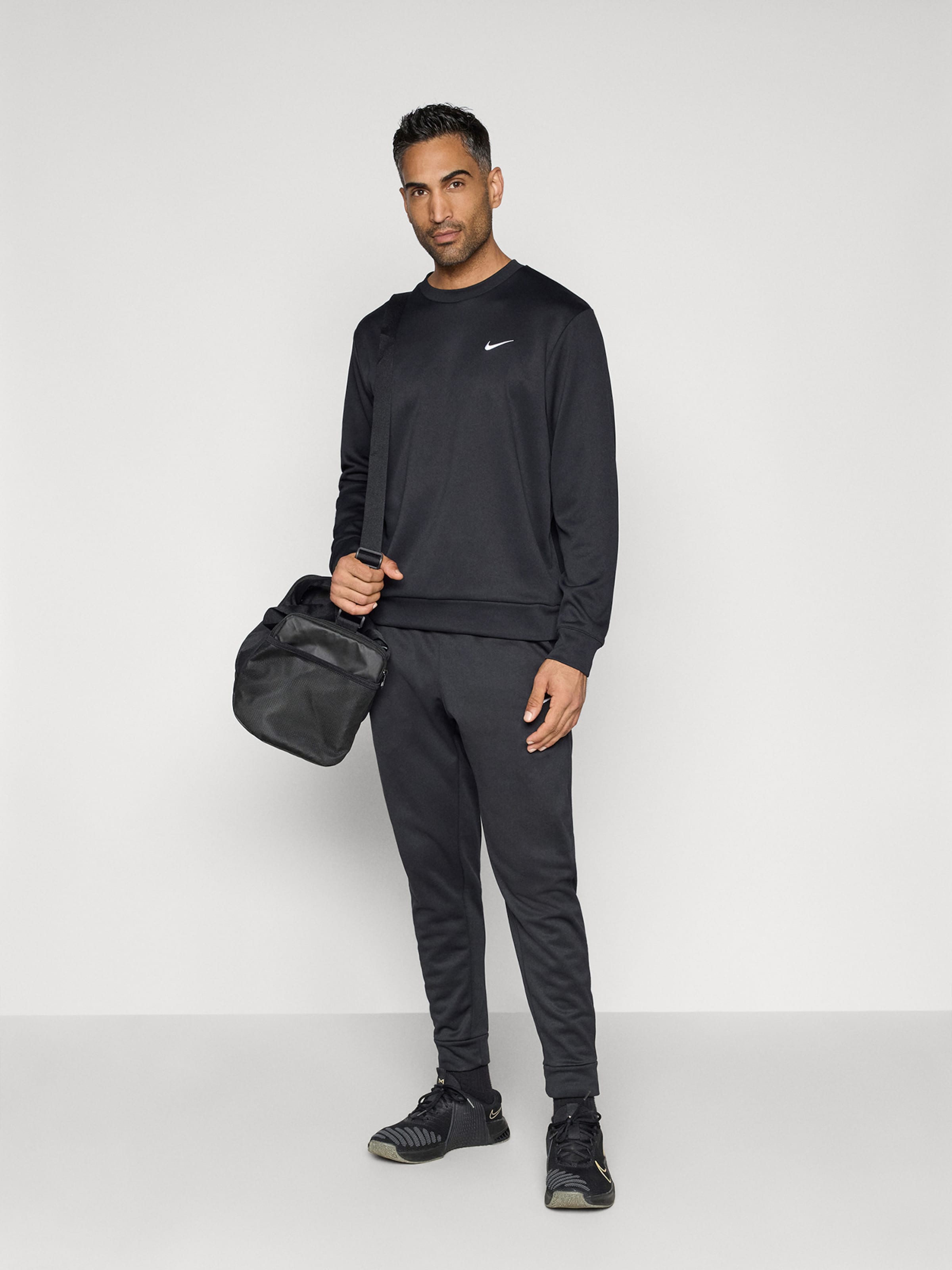 NIKE Спортивный свитшот 'FLEX' в черном цвете — фото 4