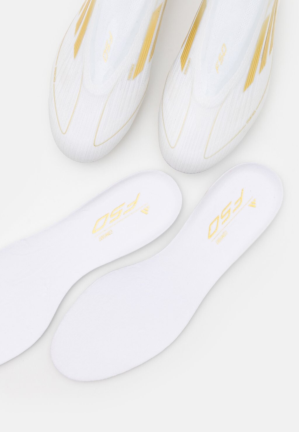 

Бутсы F50 ELITE LACELESS FIRM GROUND adidas, белый