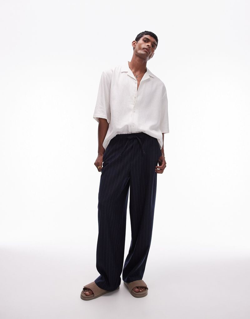 

Темно-синие широкие брюки в полоску Topman