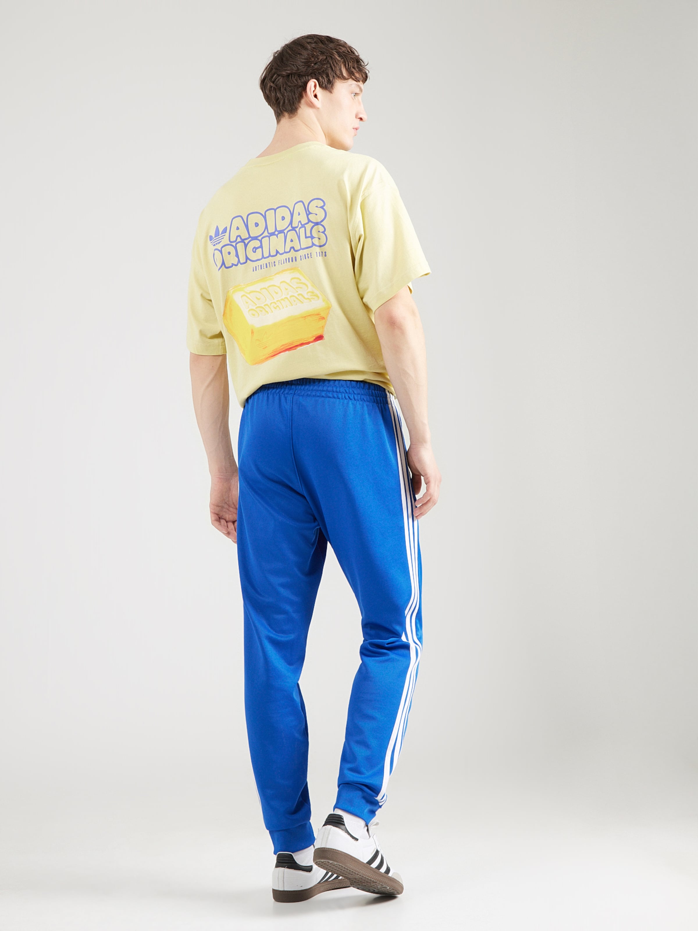 Adidas Originals Брюки с зауженным низом в синем цвете — фото 3