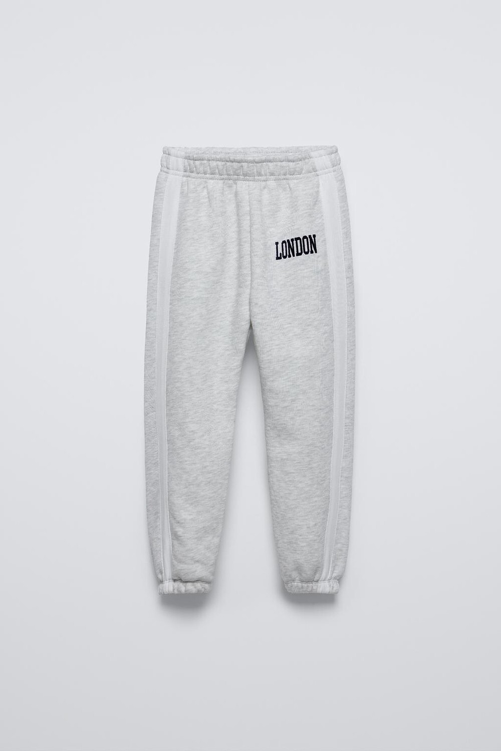 

Брюки jogger с флоковым лозунгом ZARA, серый мергель