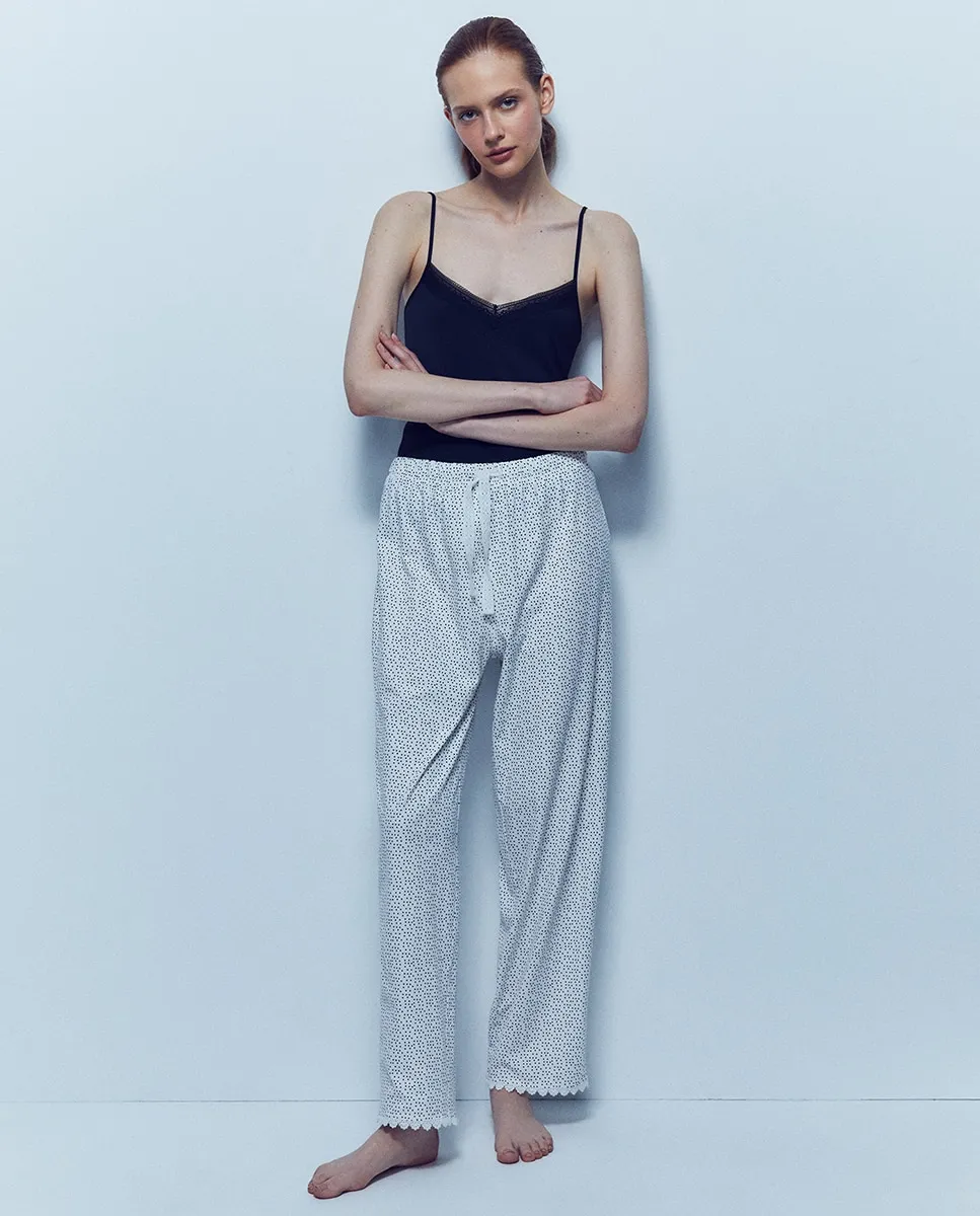 

Цветочные штаны Sfera, черный