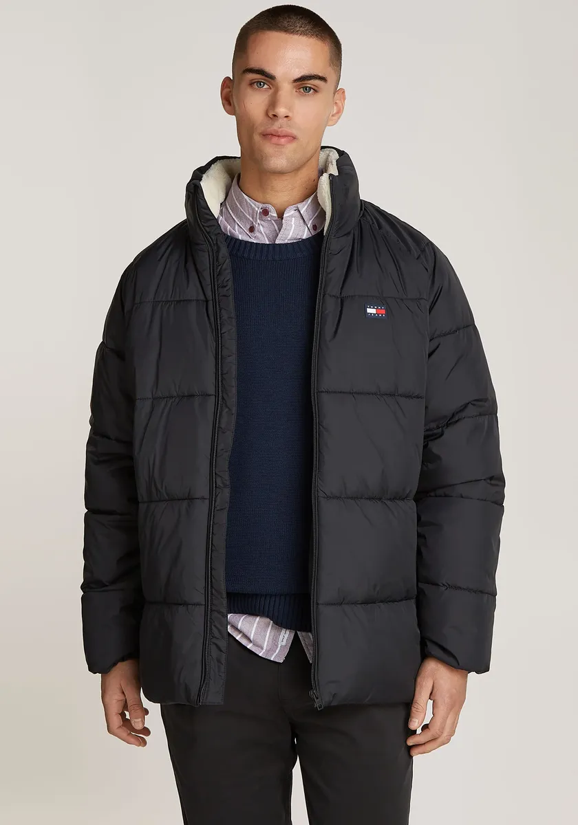 

Стеганая куртка Tommy Jeans "TJM POLY PUFFER EXT", без капюшона, специальный лимитированный выпуск к 75-летию OTTO, черный