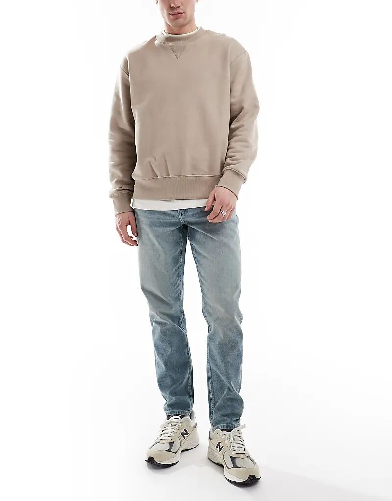 

Зауженные джинсы светло-голубого цвета ASOS DESIGN