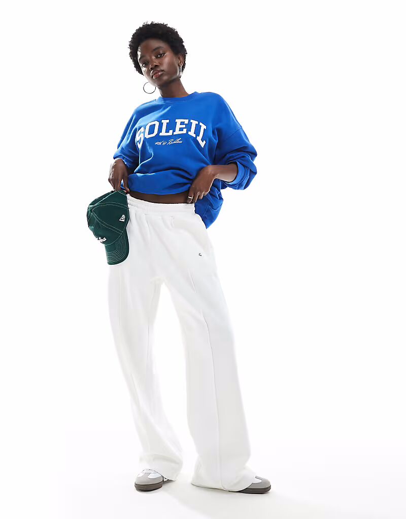 

Хлопковые брюки-джоггеры с вышитым логотипом и декоративным швом, кремового цвета 4Th & Reckless