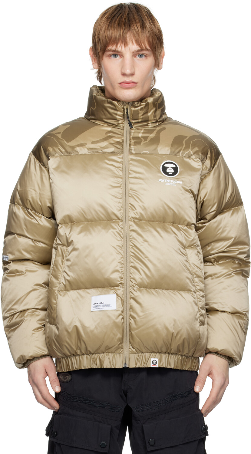 

Бежевый пуховик на молнии с логотипом «AAPE NOW» Moonface AAPE by A Bathing Ape
