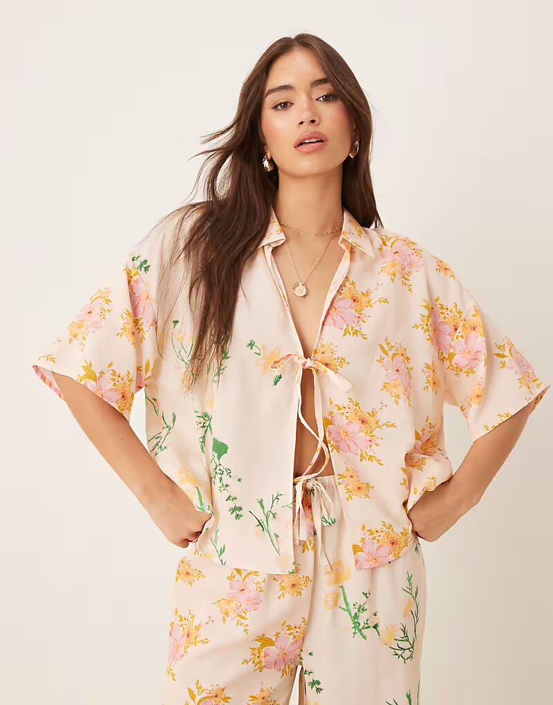 

Пляжный топ Abi с разноцветным цветочным принтом Asos Design