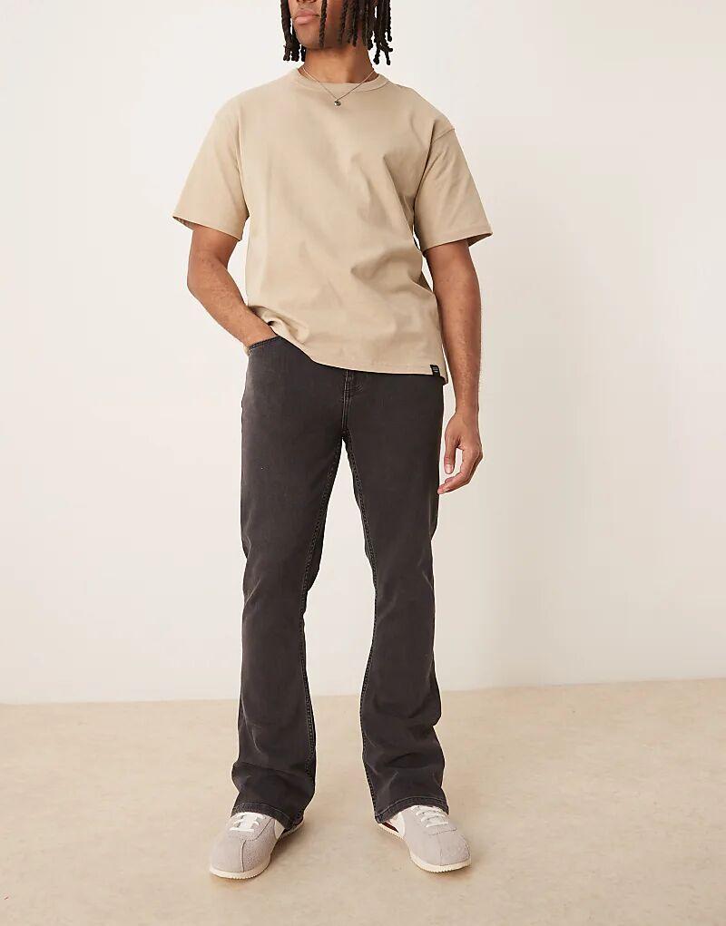 

Расклешенные джинсы ASOS DESIGN эластичного кроя черного цвета