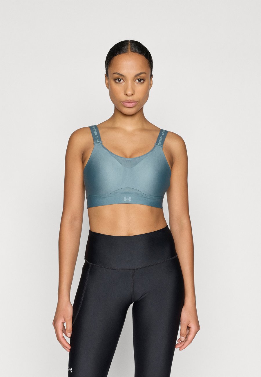 

Бюстгальтер Under Armour HIGH BRA, Jasper Blue/Serpentine/Blue