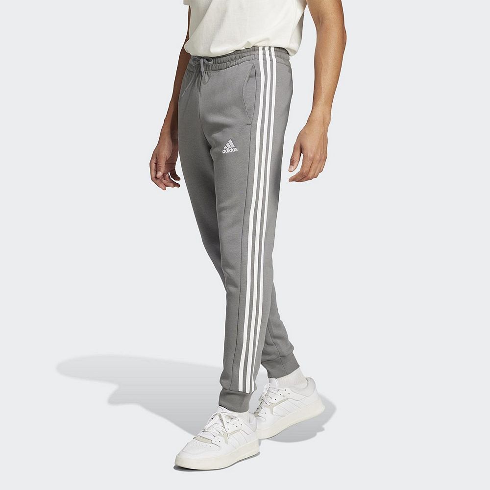 

Мужские флисовые брюки с 3 полосками adidas Essentials с зауженными манжетами Adidas, цвет Gray Four