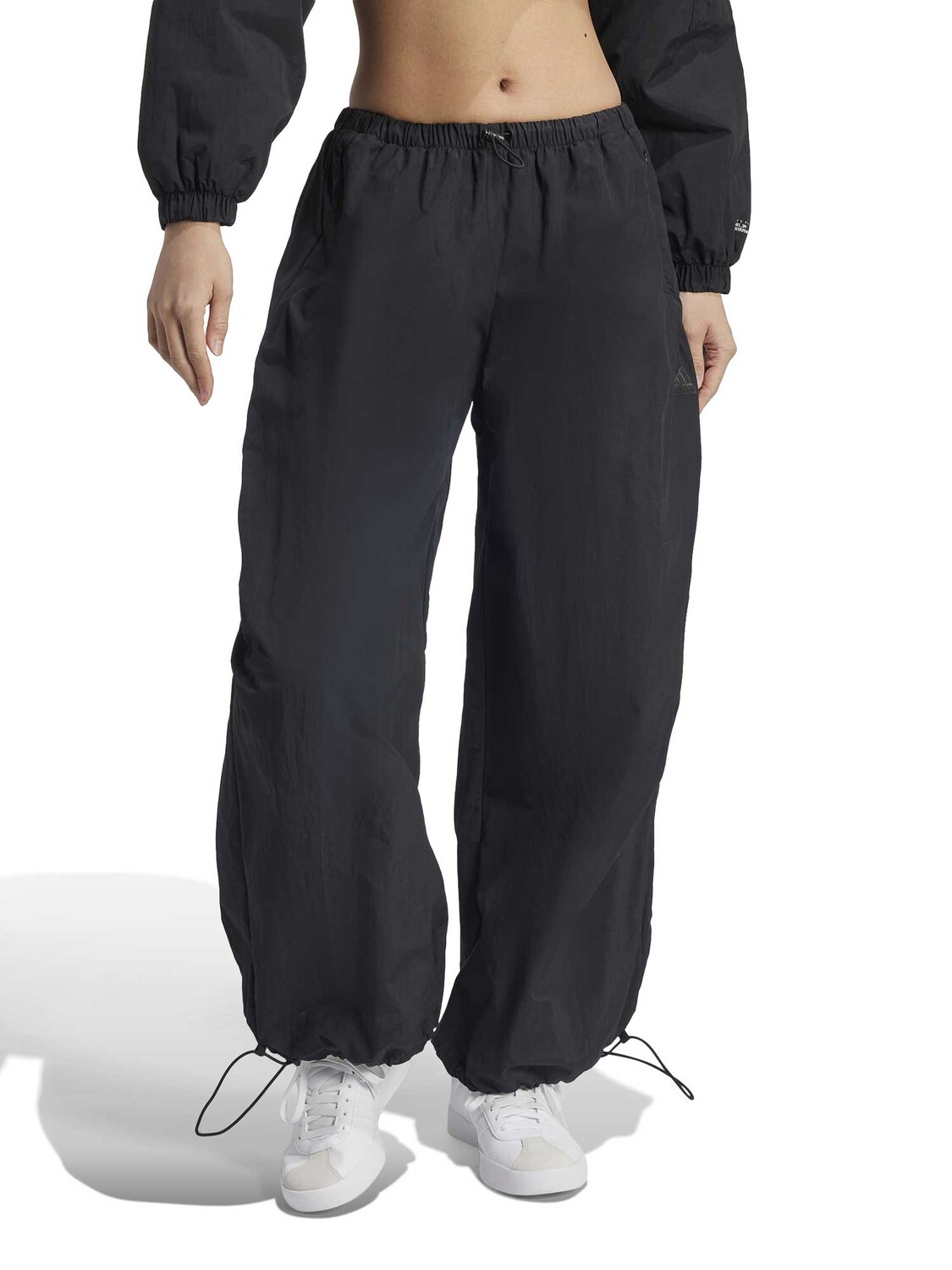 

Спортивные брюки Adidas Sportswear City Escape Woven Parachute, черный