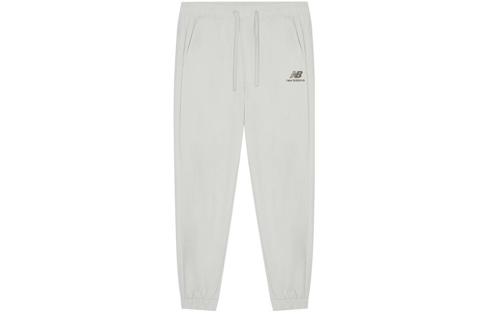

Трикотажные спортивные штаны женские серые/белые New Balance