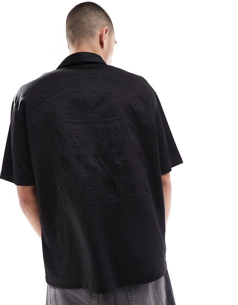 

Рубашка с коротким рукавом и рельефным узором черного цвета Bershka