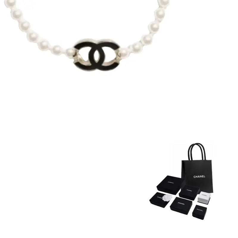 

CHANEL Унисекс-ожерелья черного цвета