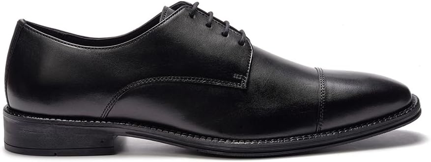 

Мужские оксфорды A. Veer Maddox с кожаным носком, Верх из телячьей кожи с полированной отделкой, Стелька с амортизацией для комфорта, Дышащая подкладка из лайкры, Резиновая подошва для сцепления и прочности, черный