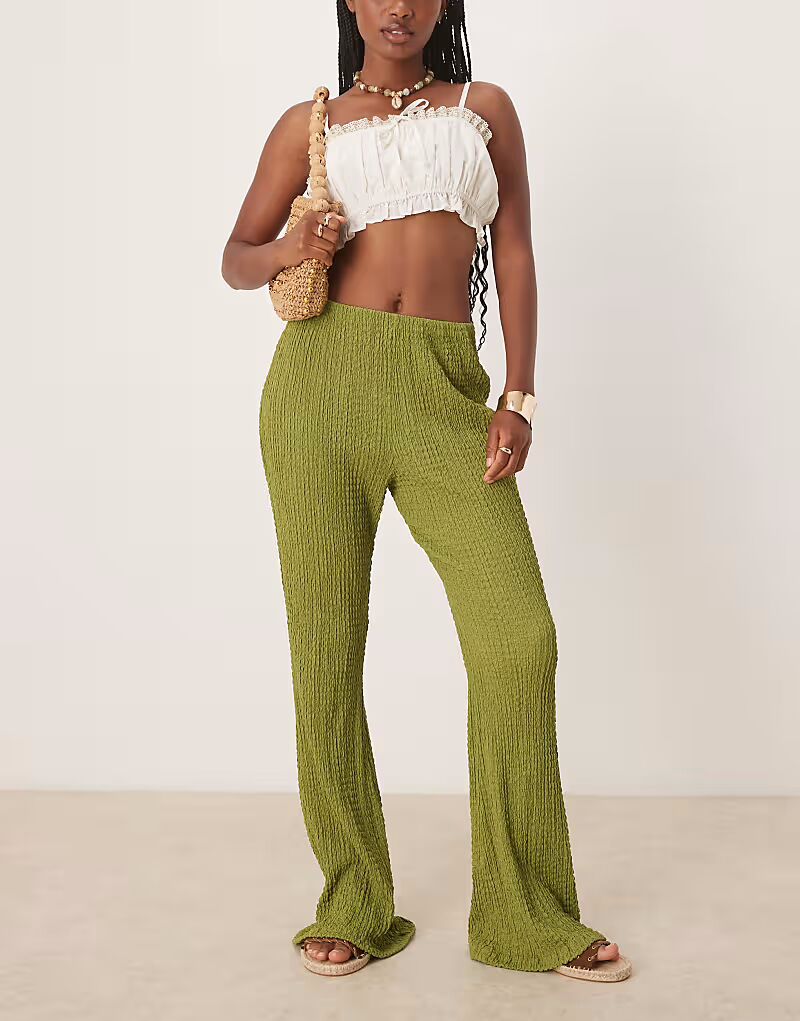 

Расклешенные брюки ASOS DESIGN зеленого цвета